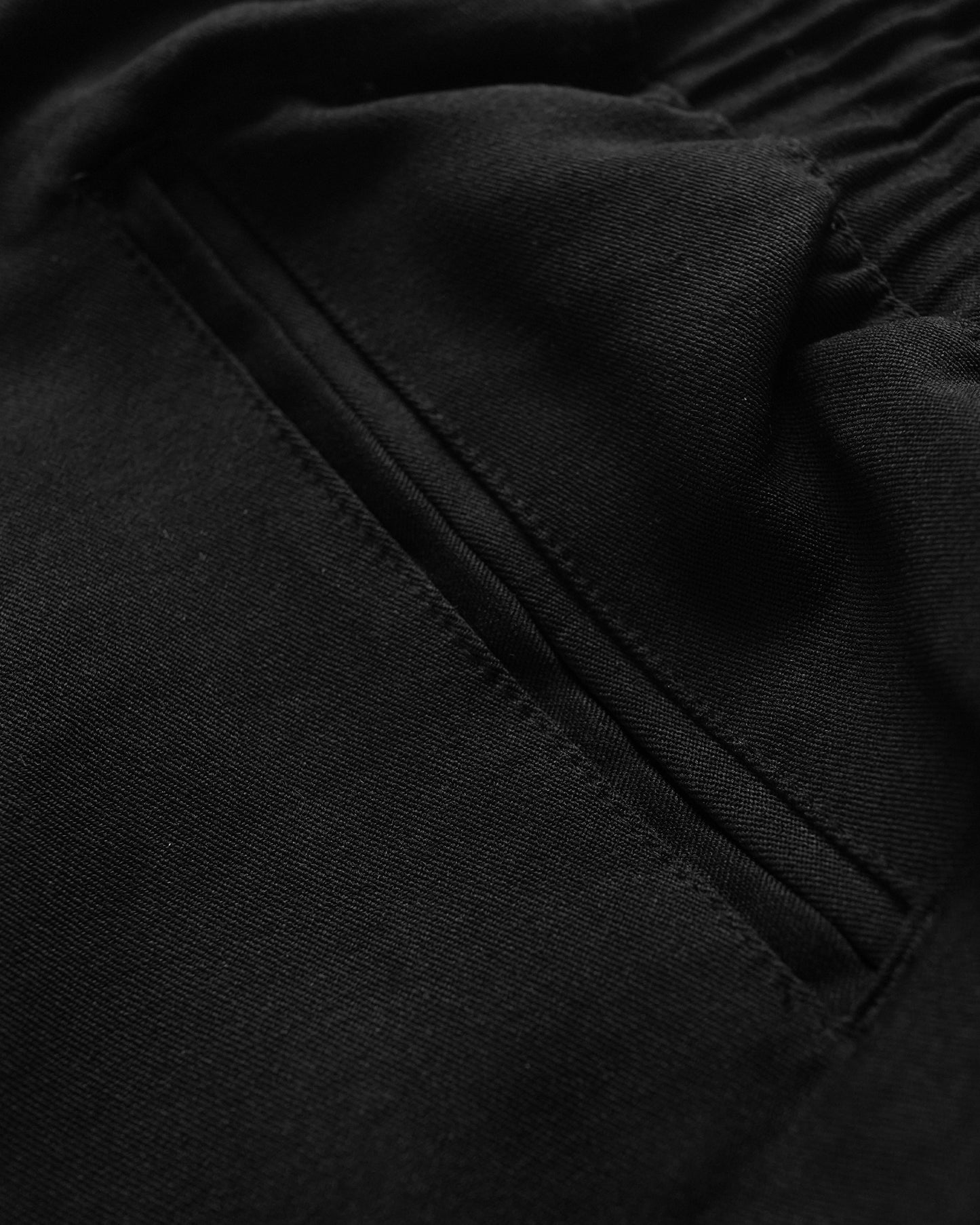 CAIRO LOOSE FIT WOVEN PLEATED PANTS