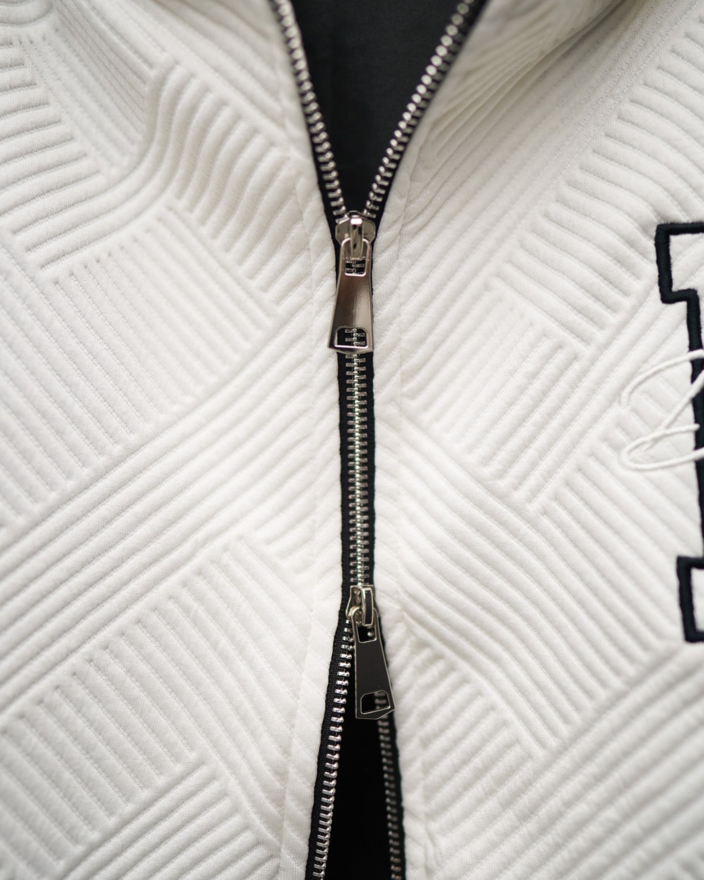 INITIAL JACQUARD DOUBLE-ZIP HOODIE